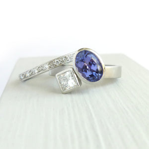 Platinum and tanzanite two band stacking ring set - contemporary, modern, bespoke and unique - interlocking.