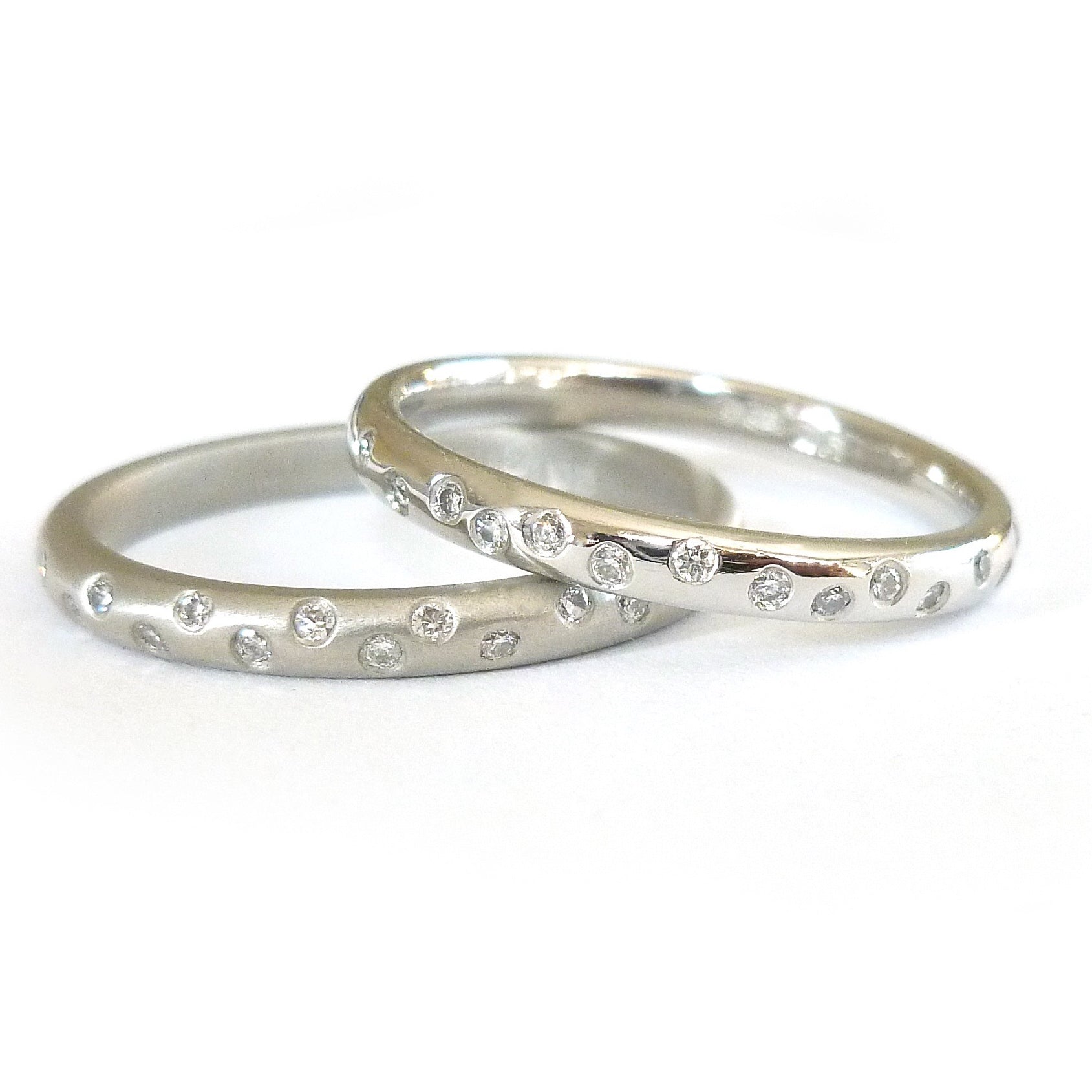 Platinum and diamond engagement, wedding or eternity ring