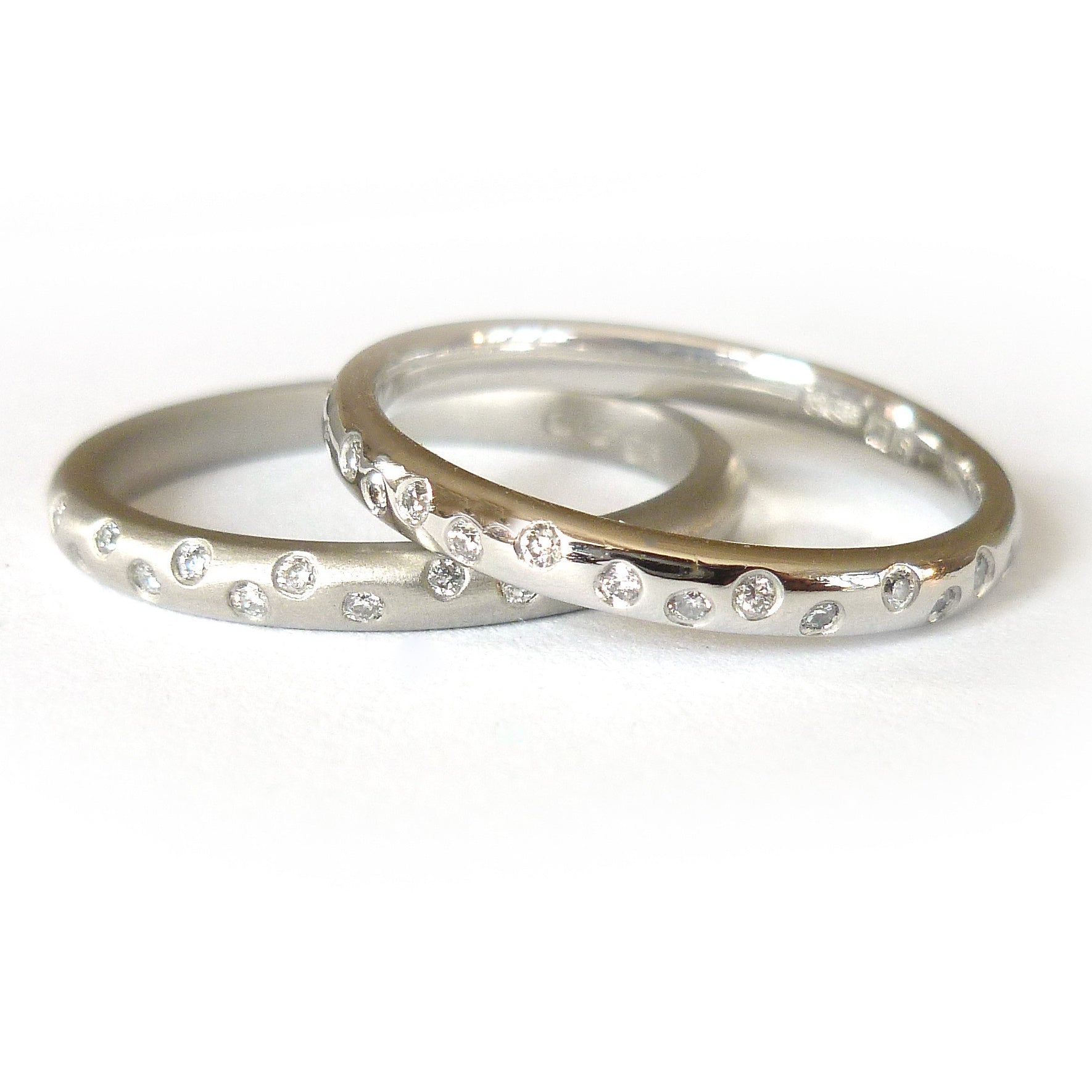 Platinum and diamond engagement, wedding or eternity ring