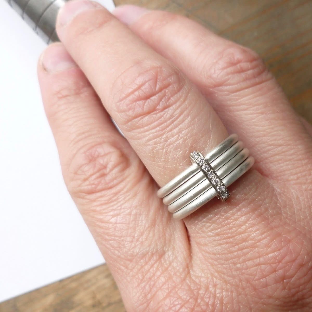 Unique bespoke sterling silver spinner ring with white gold and diamonds