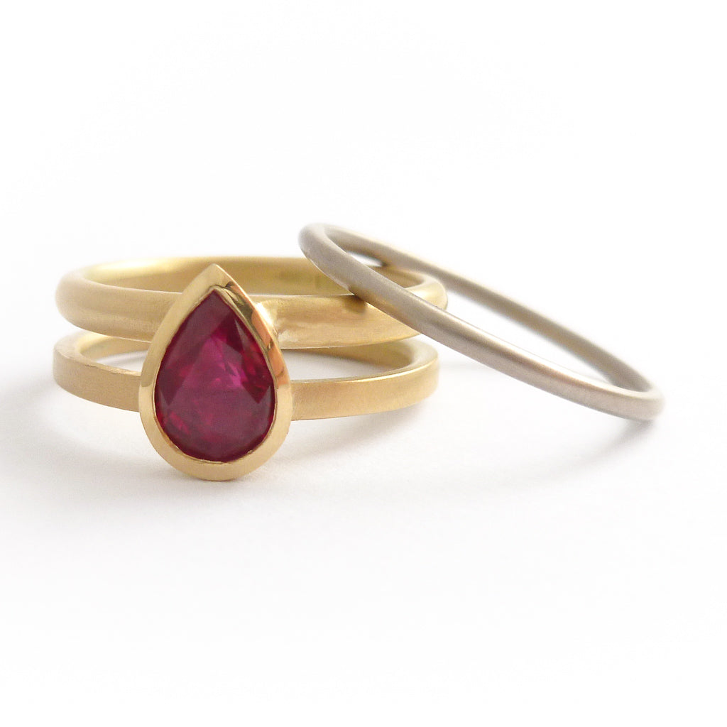 ruby 18ct yellow gold stacking ringset - perfect for a Ruby Anniversary. Unique and contemporary.