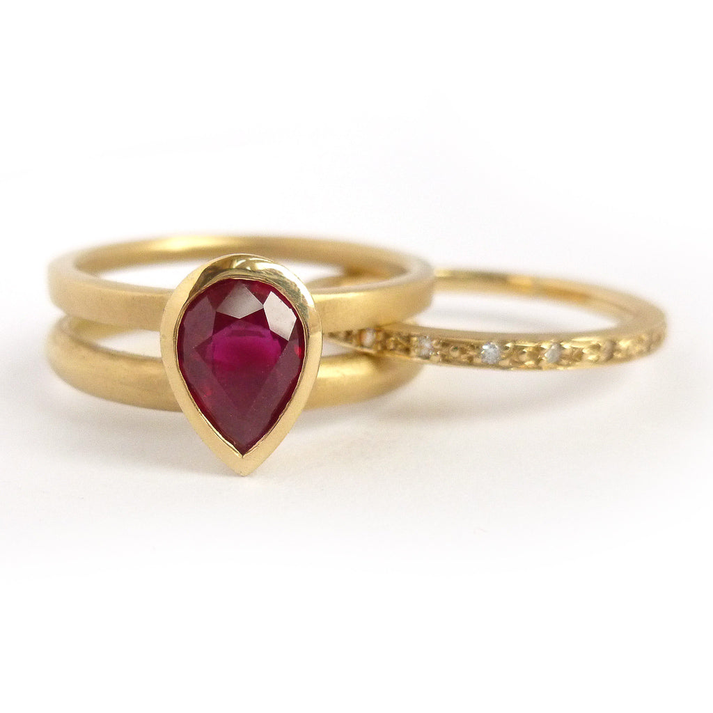 ruby 18ct yellow gold stacking ringset - perfect for a Ruby Anniversary. Unique and contemporary.