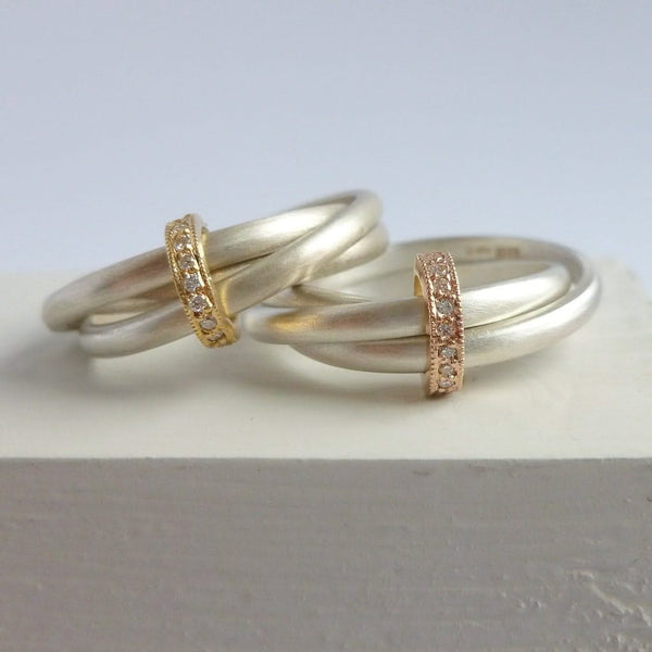 Unique modern silver and gold two tone Russian style wedding ring with diamonds 
