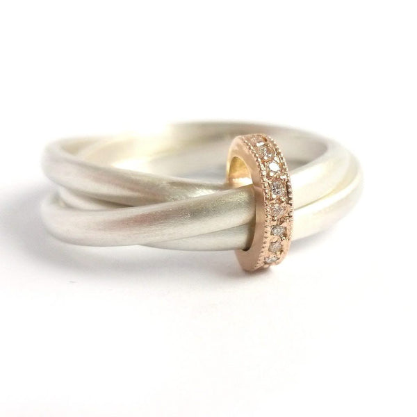 Unique modern silver and gold two tone Russian style wedding ring with diamonds 
