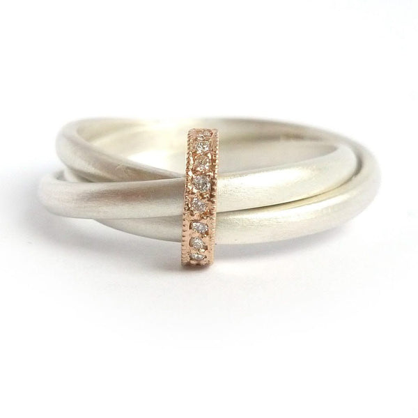 Unique modern silver and gold two tone Russian style wedding ring with diamonds 
