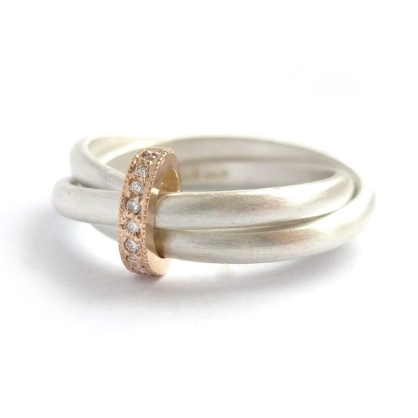 Unique modern silver and gold two tone Russian style wedding ring with diamonds 