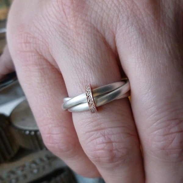 Unique modern silver and gold two tone Russian style wedding ring with diamonds 