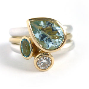 Unique and contempory 18ct gold and silver aquamarine and diamond ring