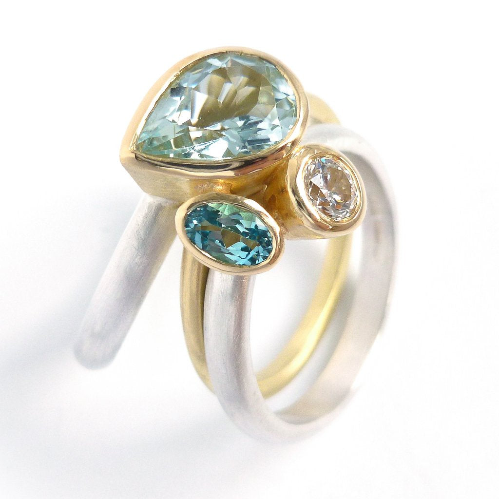 Unique and contempory 18ct gold and silver aquamarine and diamond ring