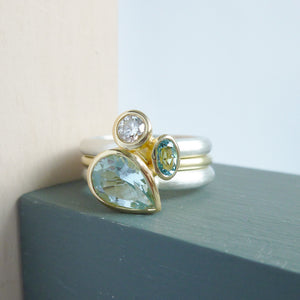Unique and contempory 18ct gold and silver aquamarine and diamond ring