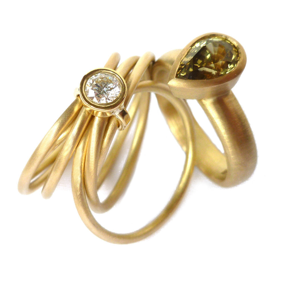 Contemporary, bespoke and modern 18k yellow gold russian style diamond wedding ring, commitment ring, eternity ring, brushed finish. Handmade by Sue Lane. Multi band ring or interlocking ring.