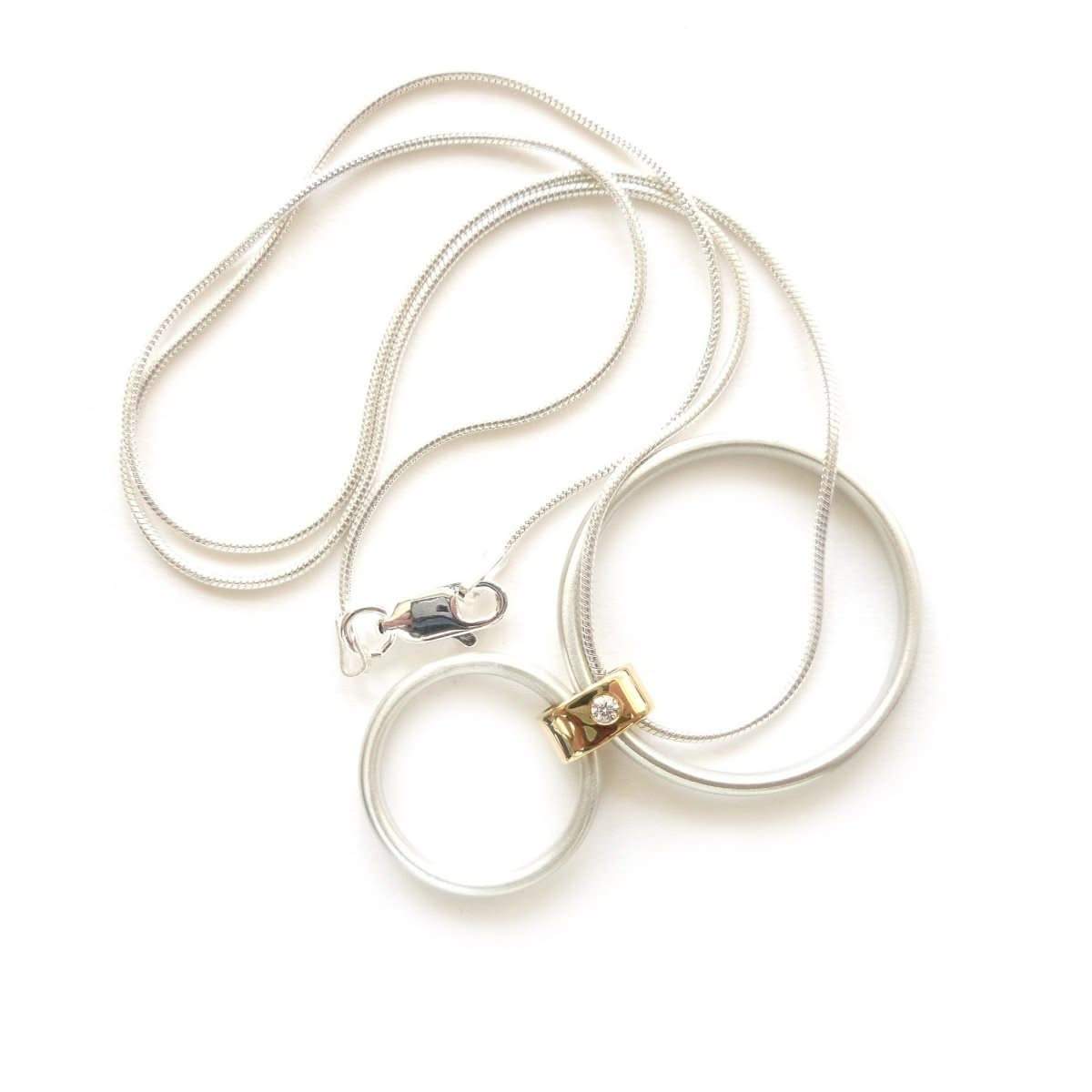 Handcrafted silver and gold necklace perfect as a bespoke wedding anniversary present