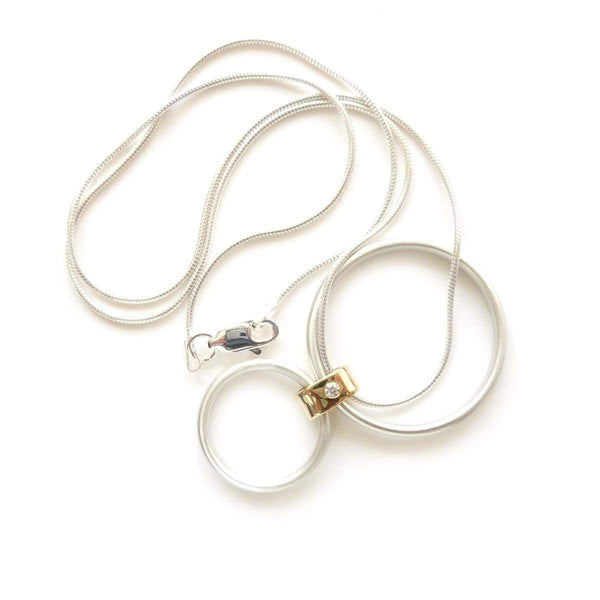 Handcrafted silver and gold necklace perfect as a bespoke wedding anniversary present