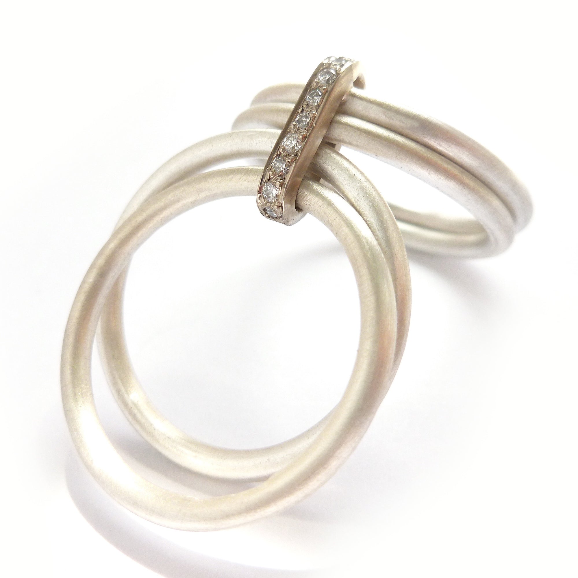 Contemporary unique bespoke handmade and modern silver and gold two tone pave set diamond ring handmade by Sue Lane