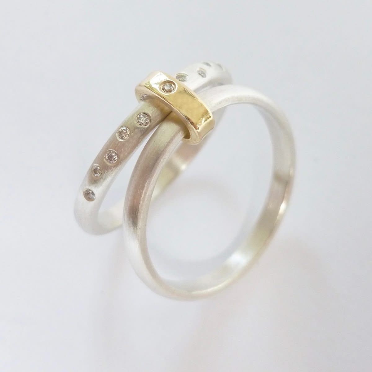 Unique two band silver and diamond ring