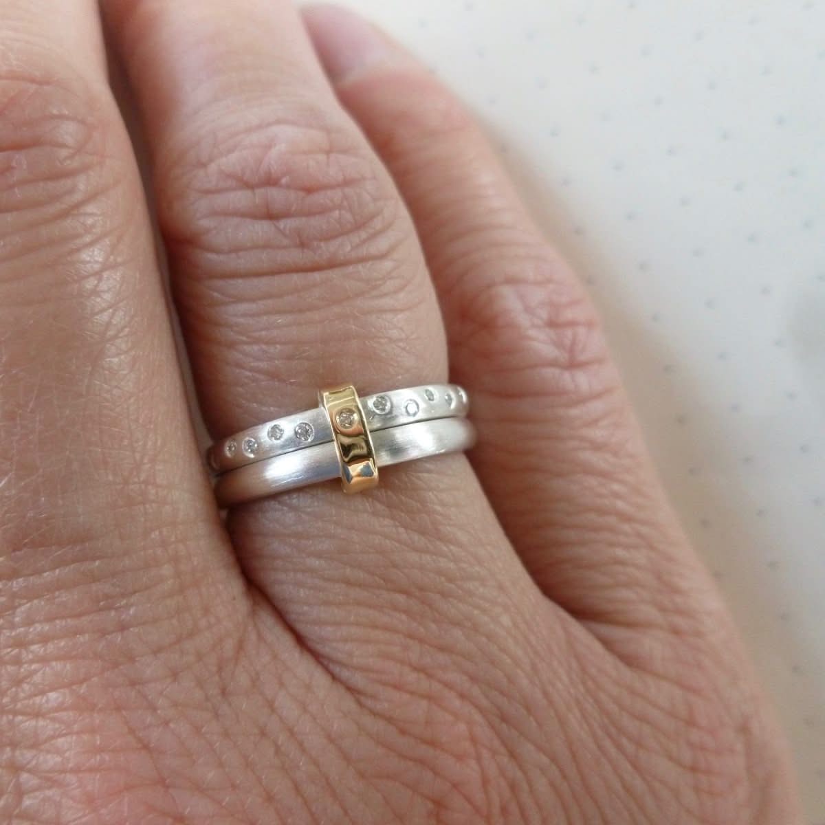 Unique two band silver and diamond ring