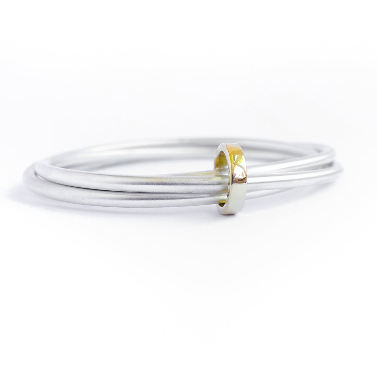 Unusual, unique, bespoke and modern silver and gold Russian style bangle with brushed finish. Handmade by Sue Lane Jewellery in Herefordshire, UK