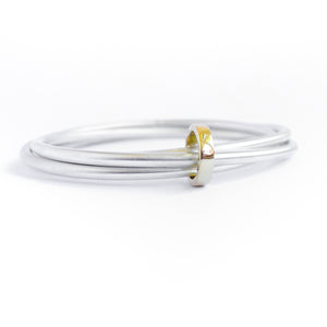 Unusual, unique, bespoke and modern silver and gold Russian style bangle with brushed finish. Handmade by Sue Lane Jewellery in Herefordshire, UK