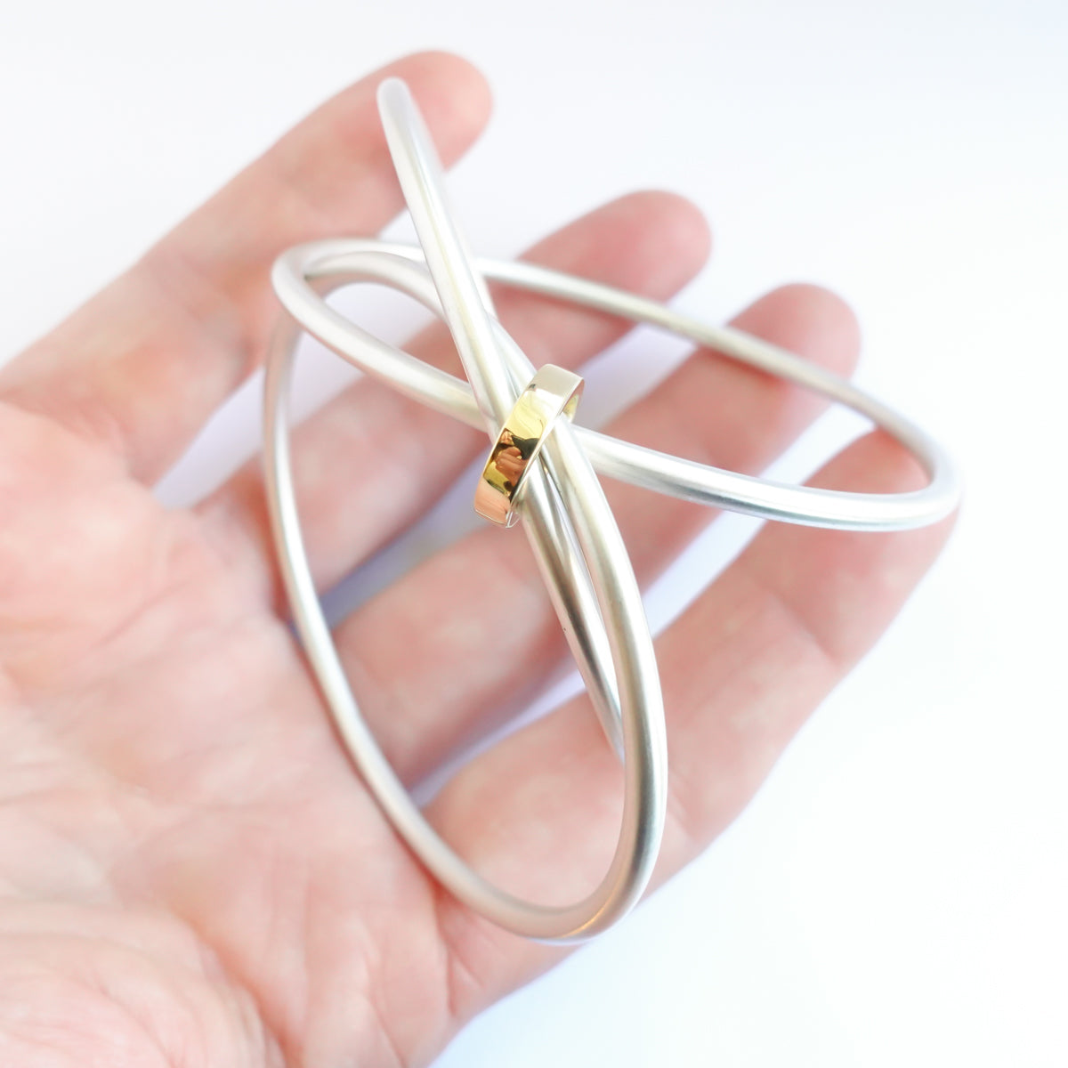Unusual, unique, bespoke and modern silver and gold Russian style bangle with brushed finish. Handmade by Sue Lane Jewellery in Herefordshire, UK