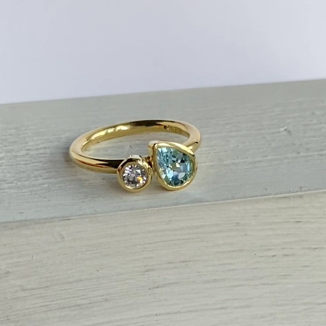 Contemporary, unique and modern aquamarine and diamond 18ct gold ring