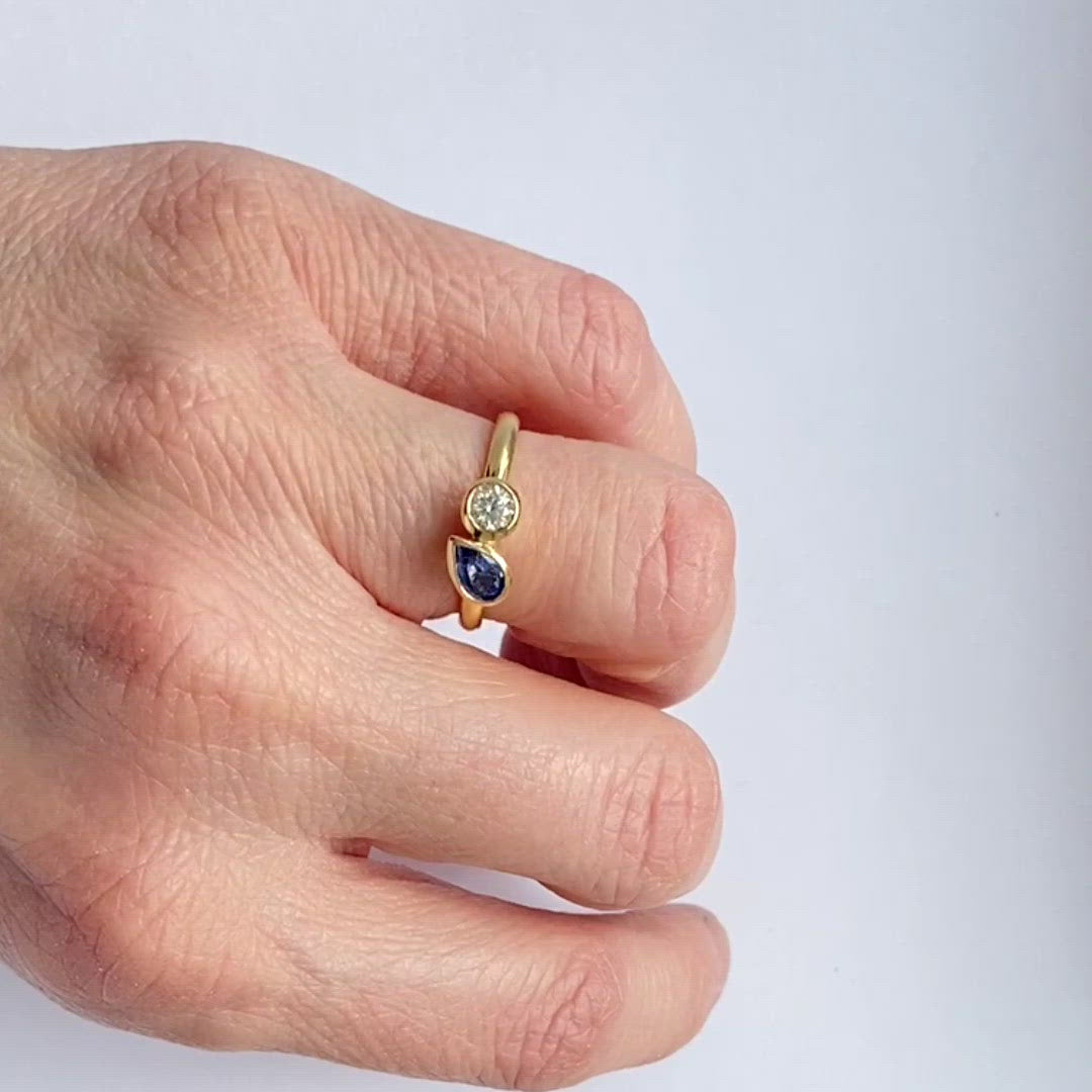 Bespoke pear shape blue sapphire and diamond ring by Sue Lane