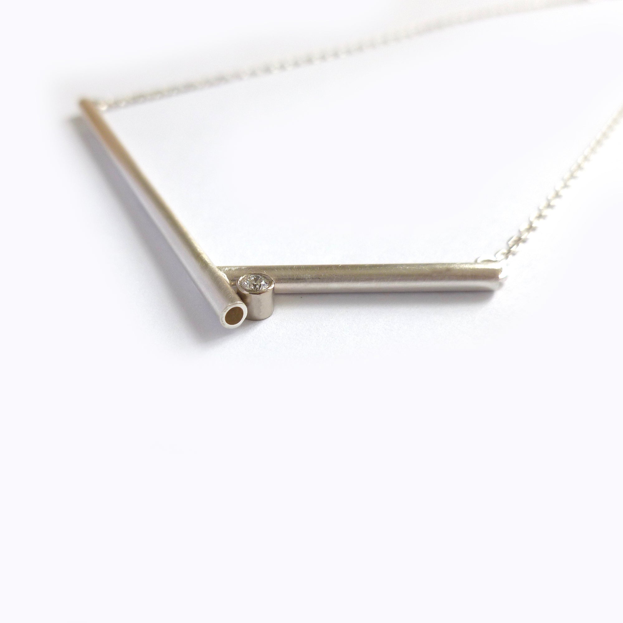 simple contemporary silver and diamond necklace by Sue Lane 