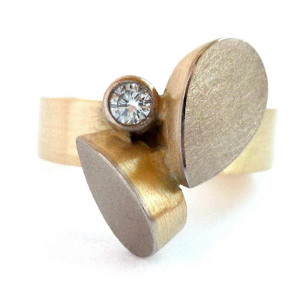 A stunning alternative 18ct gold diamond ring. Bespoke and Unique.