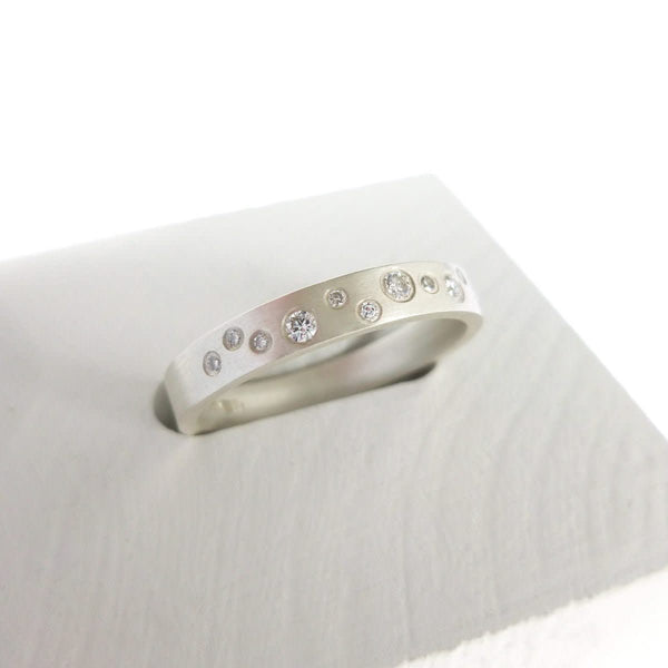 Unusual silver and diamond luxury handmade wedding or eternity ring