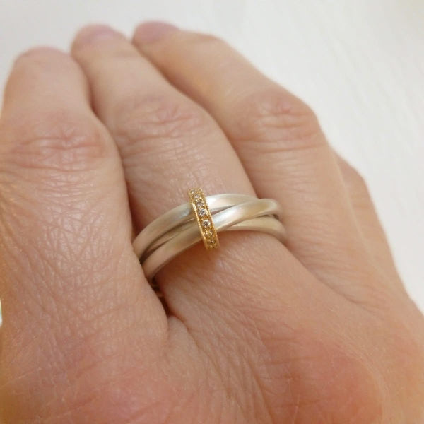 modern silver and gold two tone Russian style wedding ring with diamonds 