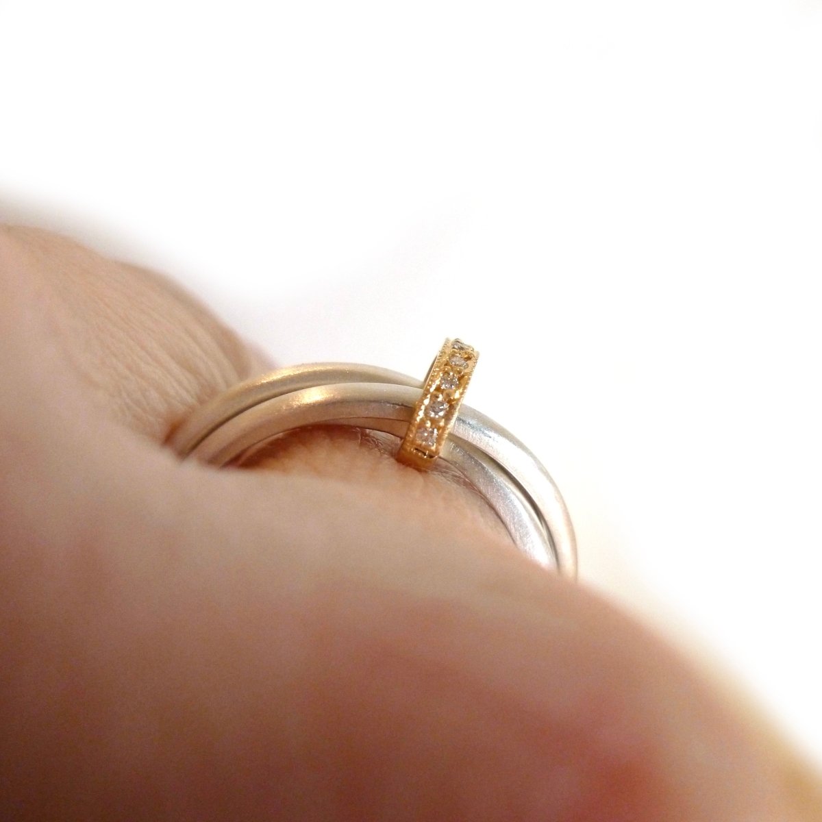 modern silver and gold two tone Russian style wedding ring with diamonds 