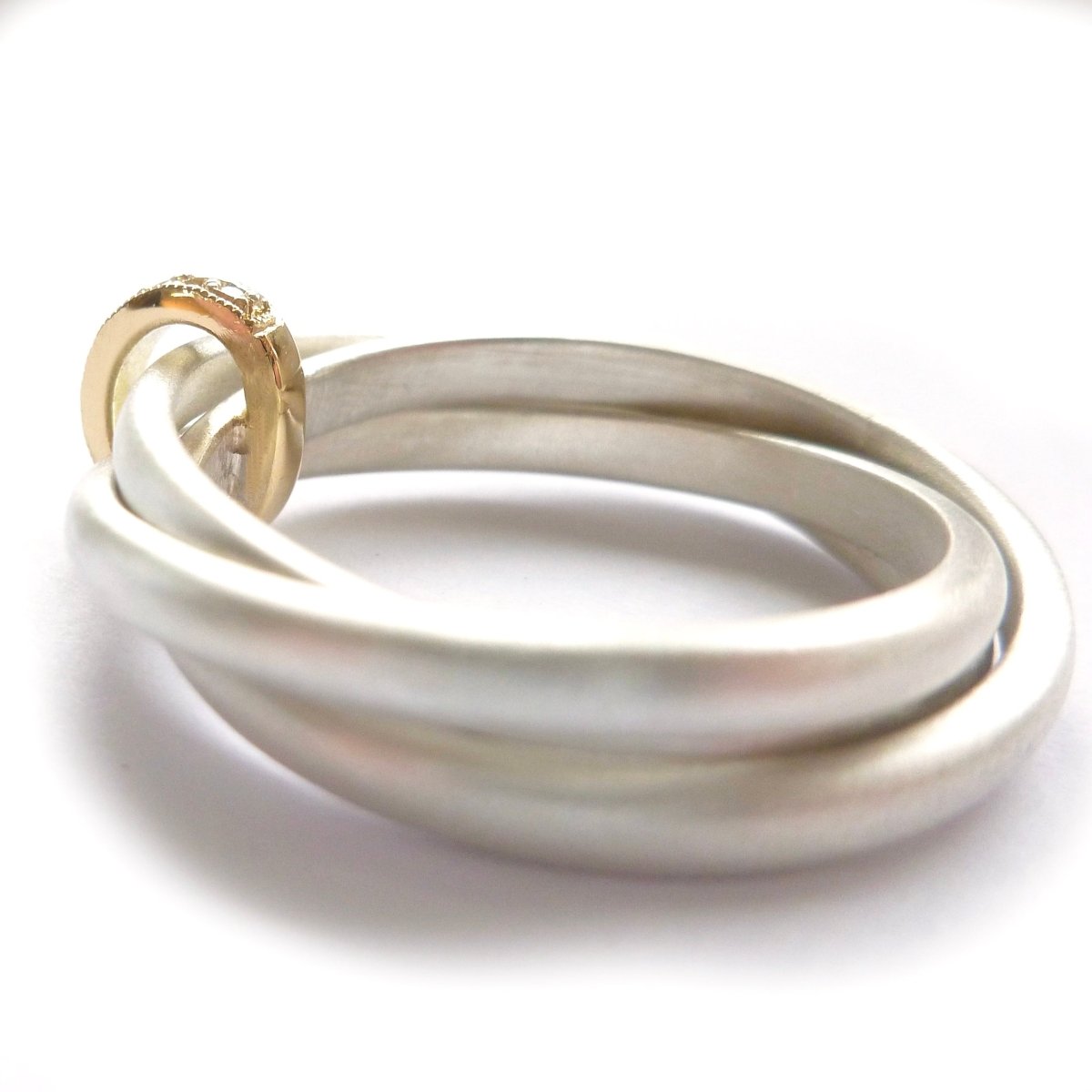 Unique modern silver and gold two tone Russian style wedding ring with diamonds 