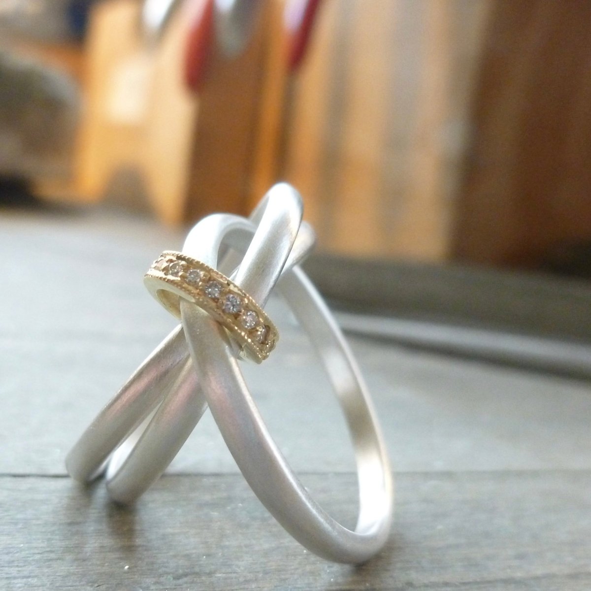 modern silver and gold two tone Russian style wedding ring with diamonds 