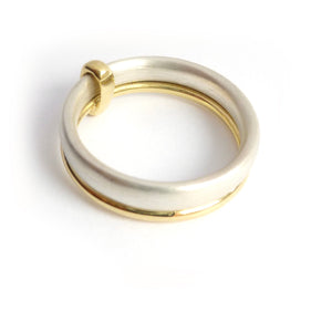 Simple and modern handmade two band stacking ring in silver and gold, an alternative wedding or dress ring