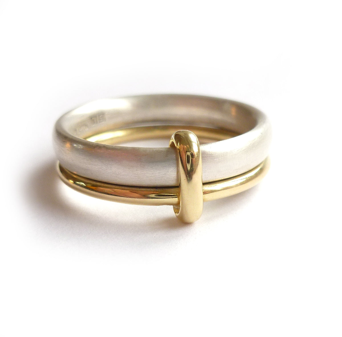 Simple and modern two band stacking ring in silver and gold