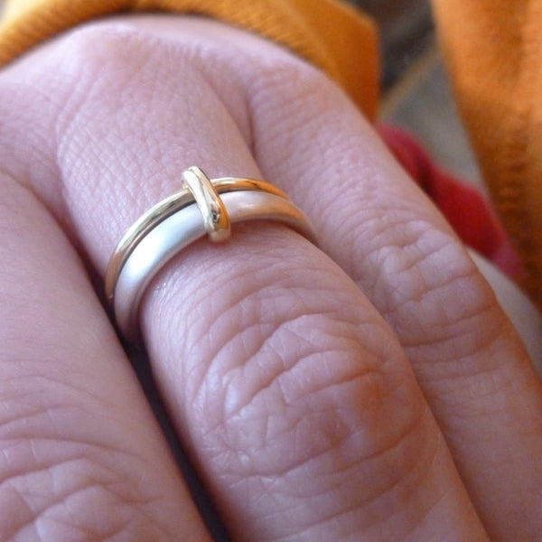 Simple and modern handmade two band stacking ring in silver and gold, an alternative wedding or dress ring