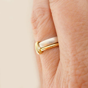 Simple and modern handmade two band stacking ring in silver and gold, an alternative wedding or dress ring