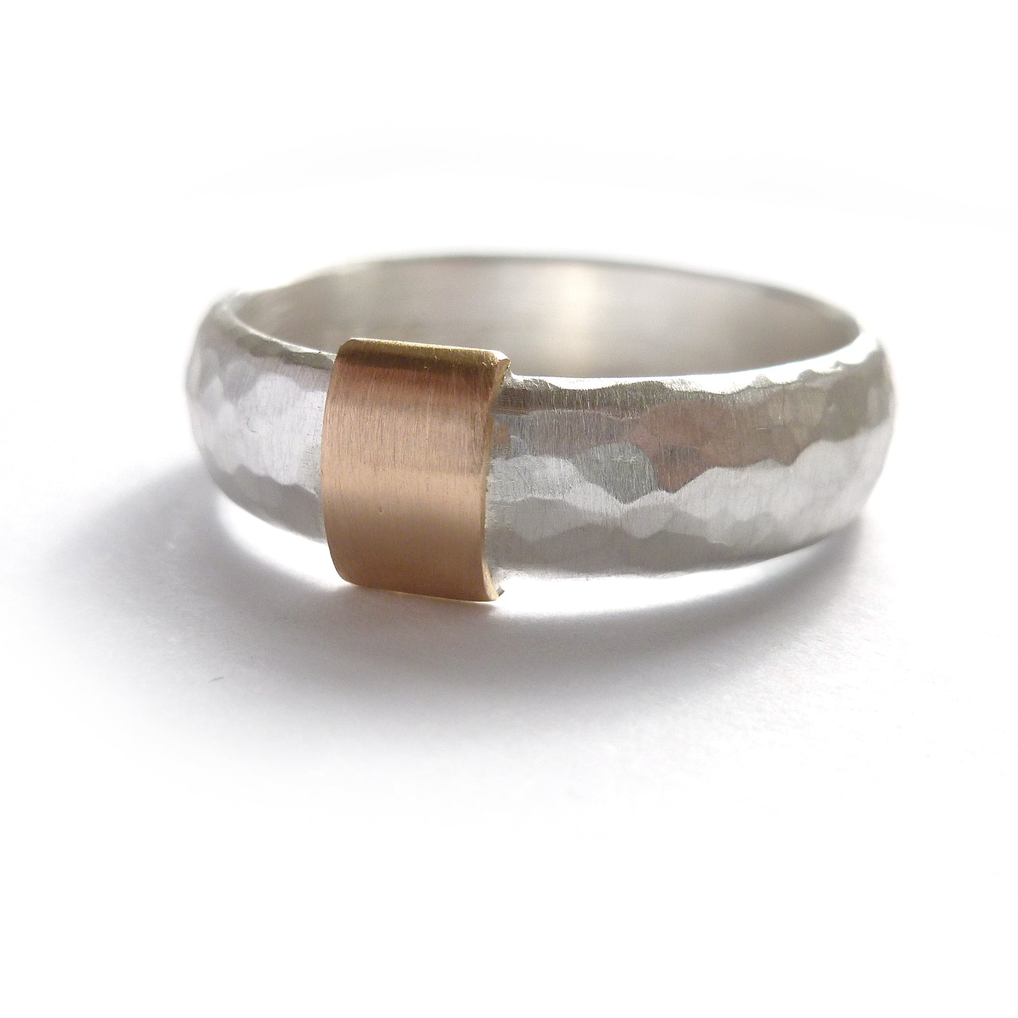 modern and unusual two tone silver and gold chinky ring for men or woman with a hammered finish. Handmade in UK