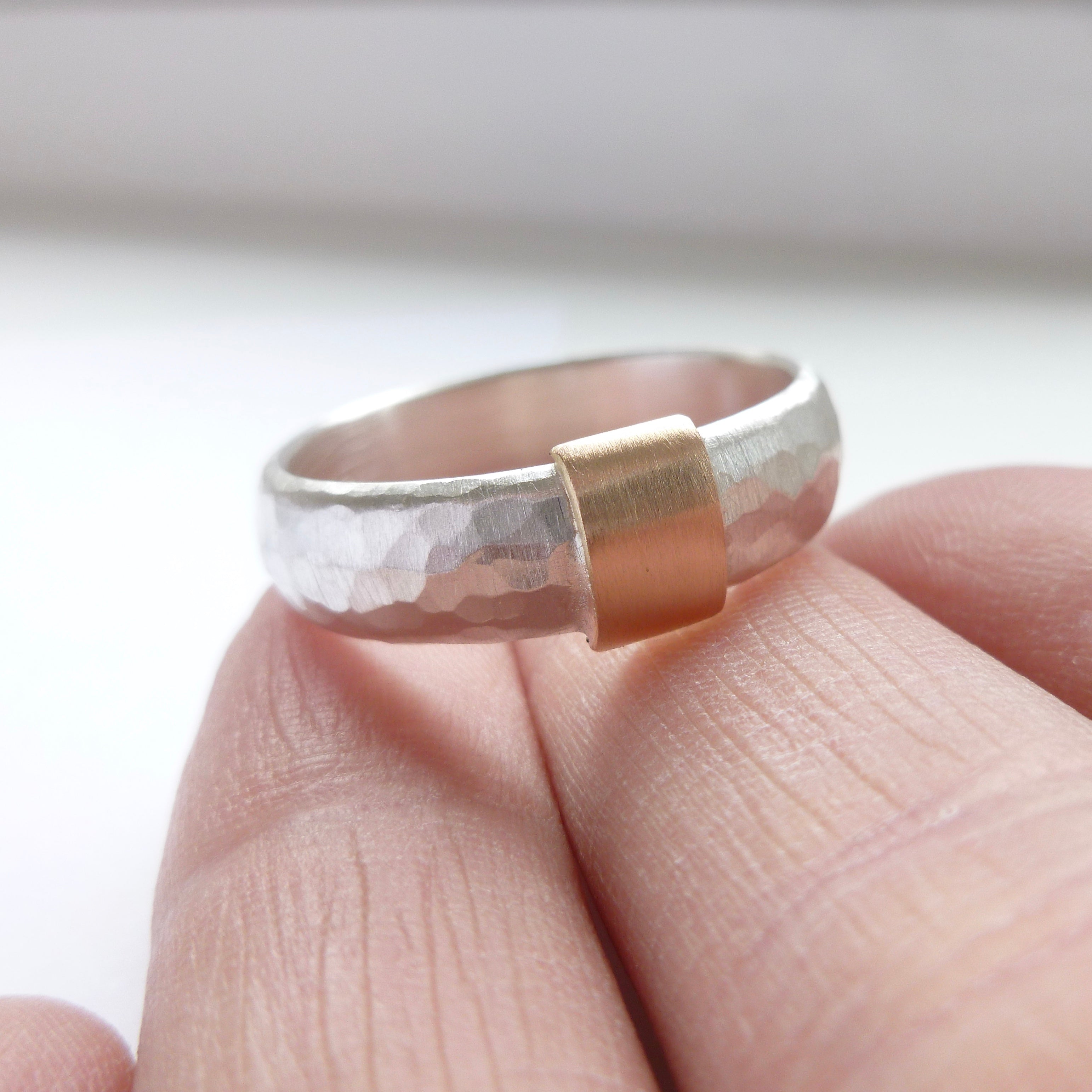 modern and unusual two tone silver and gold chunky ring for men or woman with a hammered finish. Handmade in UK