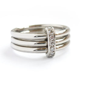 Contemporary platinum wedding engagement ring made to order / commission / bespoke. Multi band ring or interlocking ring, sometimes called triple band rings too.