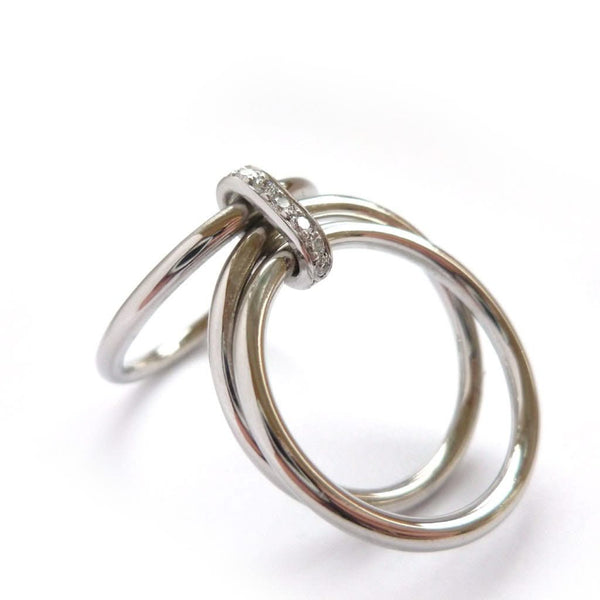 Unusual, unique, bespoke and modern platinum and diamond wedding ring, contemporary eternity ring, engagement ring, Handmade by Sue Lane in Herefordshire, UK. Multi band ring or interlocking ring, sometimes called triple band rings too.