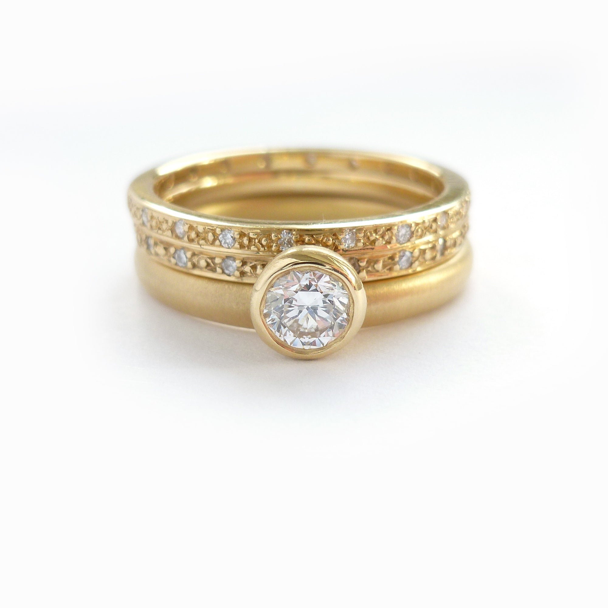modern and bespoke gold and diamond stacking ringset handmade in the UK 