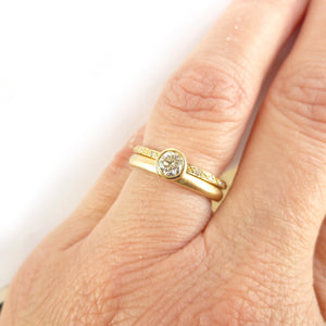 Modern two band diamond ring alternative modern engagement ring Sue Lane. Multi band ring or interlocking ring, sometimes called double band ring too.