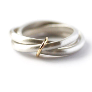 Unusual, unique, bespoke and modern silver "Russian Wedding ring" playful and tactile with brushed finish. Handmade by Sue Lane Contemporary Jewellery UK. 