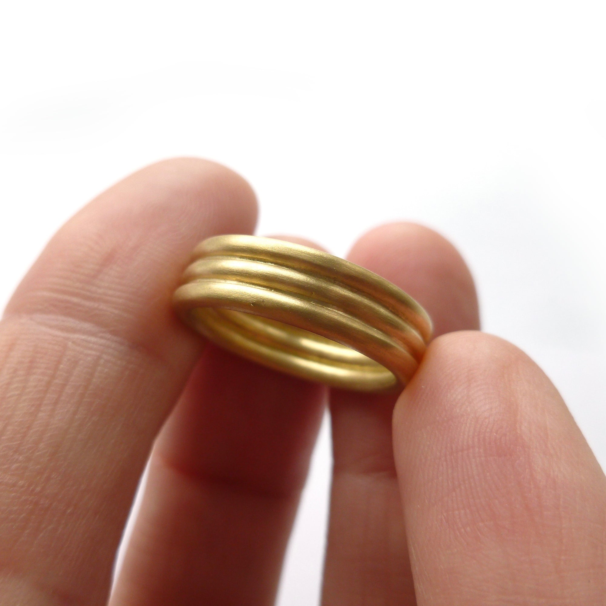 Unique alternative matt wedding ring for men or women. Contemporary modern bespoke and handmade.
