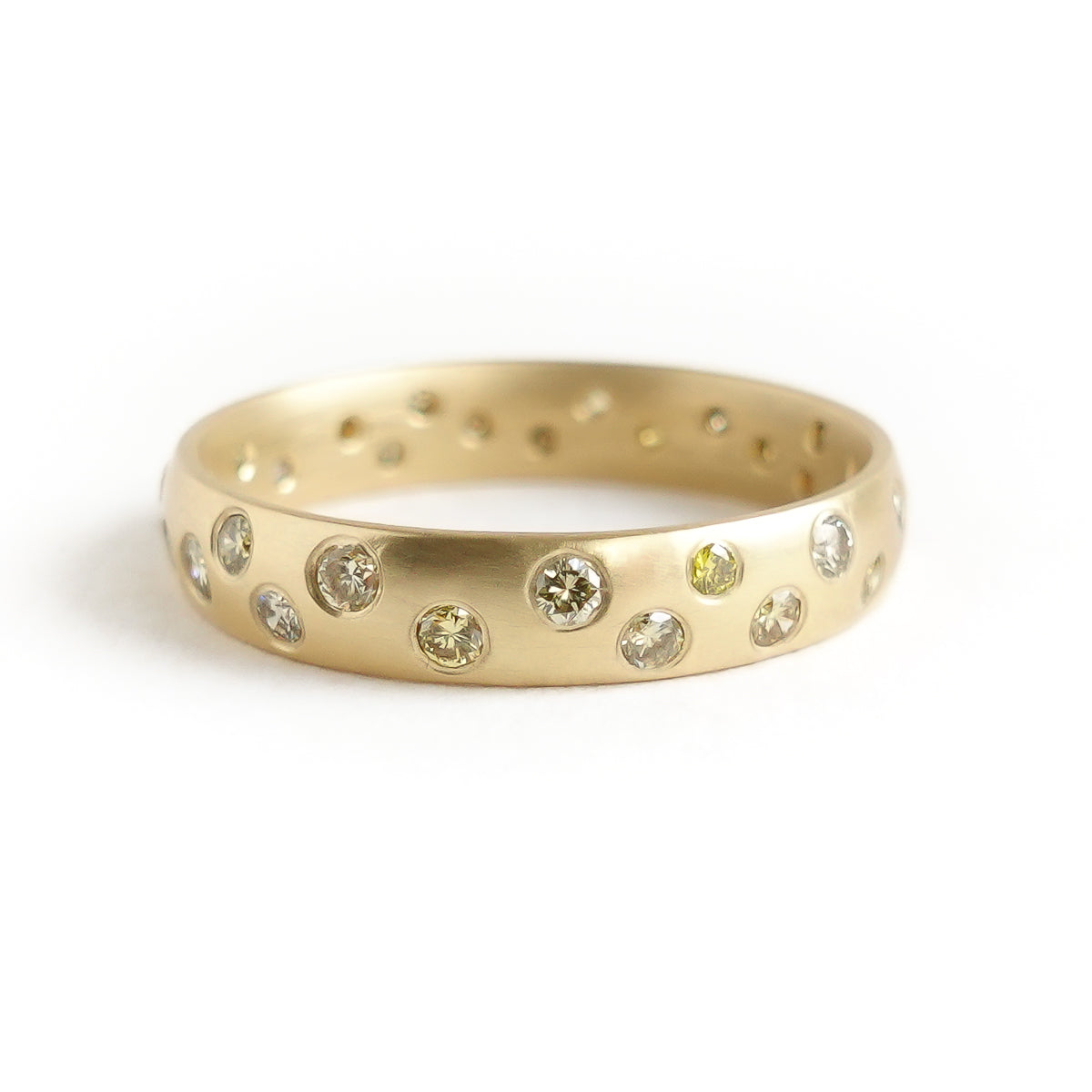 A modern, contemporary gold eternity ring, wedding ring, or engagement ring by Sue Lane