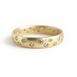 A modern, contemporary gold eternity ring, wedding ring, or engagement ring by Sue Lane