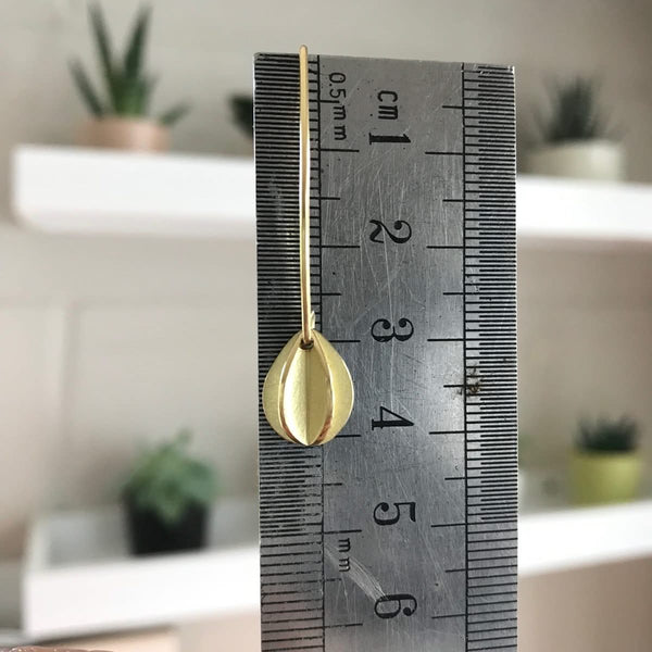 Handmade modern unique leaf hook earrings in yellow gold handmade with a brushed finish