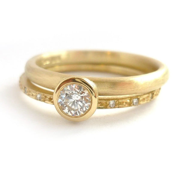 Modern two band diamond ring alternative modern engagement ring Sue Lane. Multi band ring or interlocking ring, sometimes called double band ring too.