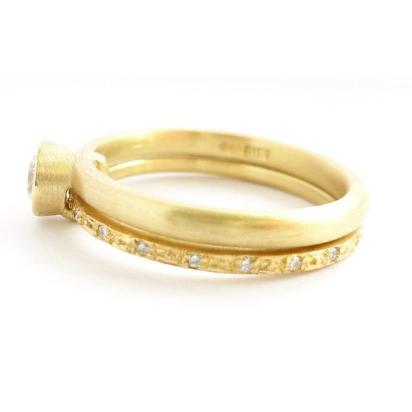 Modern two band diamond ring alternative modern engagement ring Sue Lane. Multi band ring or interlocking ring, sometimes called double band ring too.