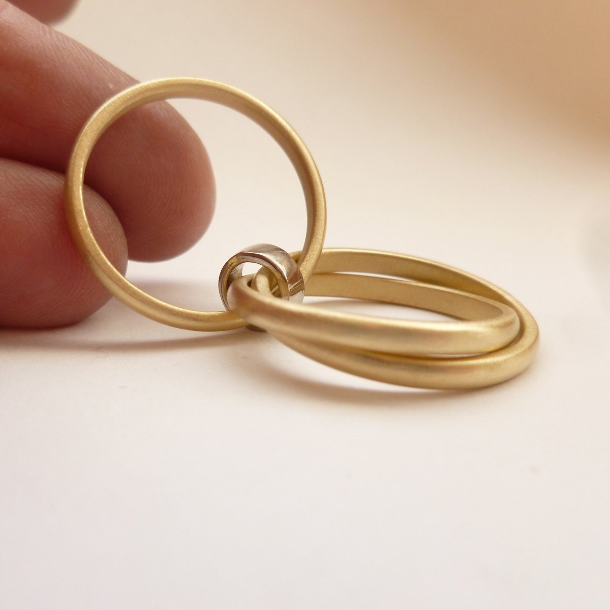 modern two tone russian style ring with 3 band linked together, handmade in the UK